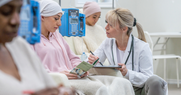 oncology pharmacist at work with patients